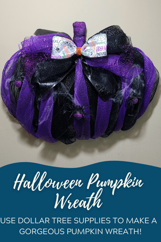 Halloween pumpkin wreath made with black and purple deco mesh, black sequin ribbon, purple glitter mesh, and Halloween word printed ribbon as a bow.