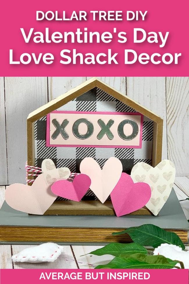 Dollar Tree Valentine's Day decor: wood house made with black and white buffalo check, pink, and light pink paper hearts.