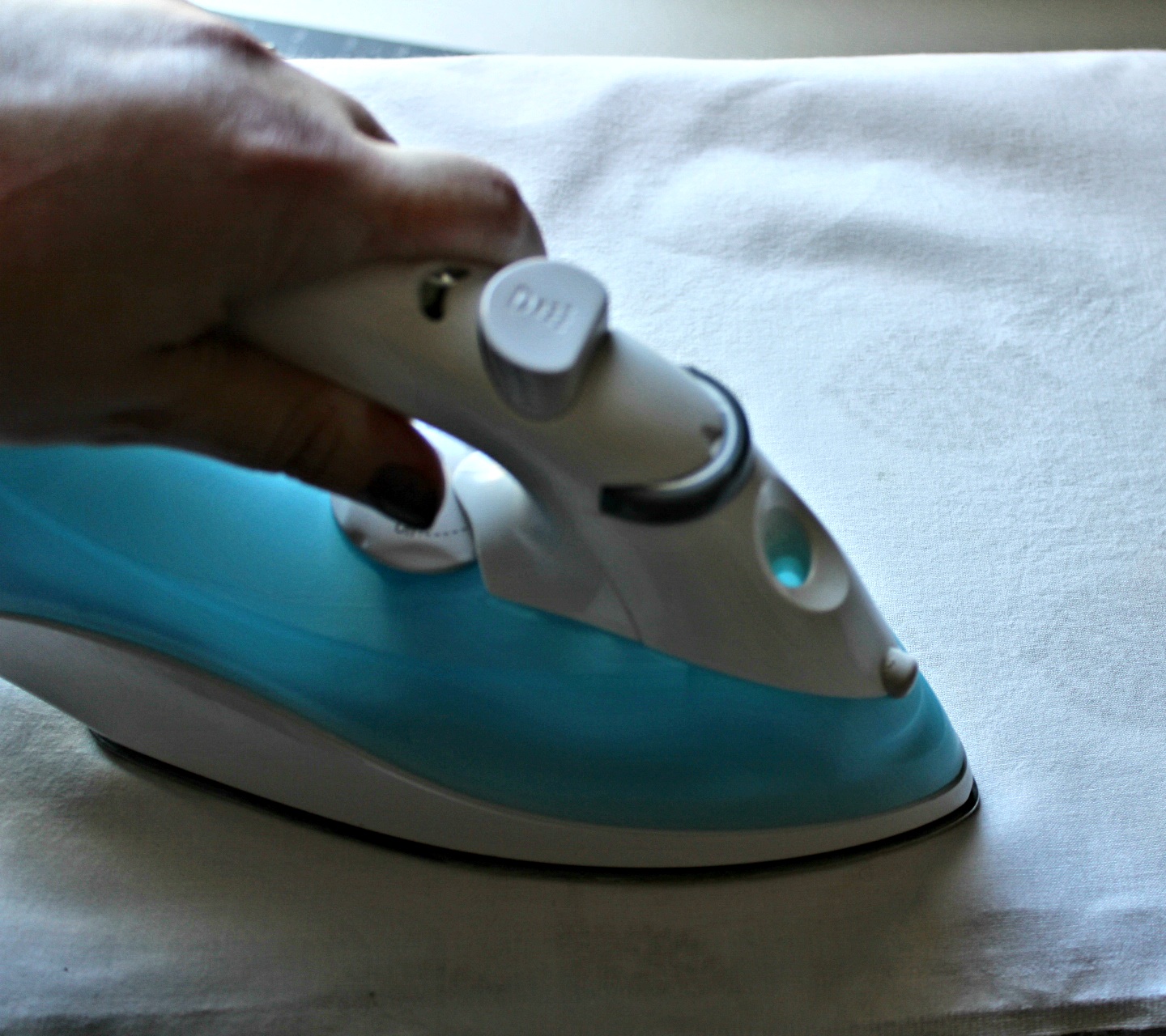 Ironing the DIY tea towel.