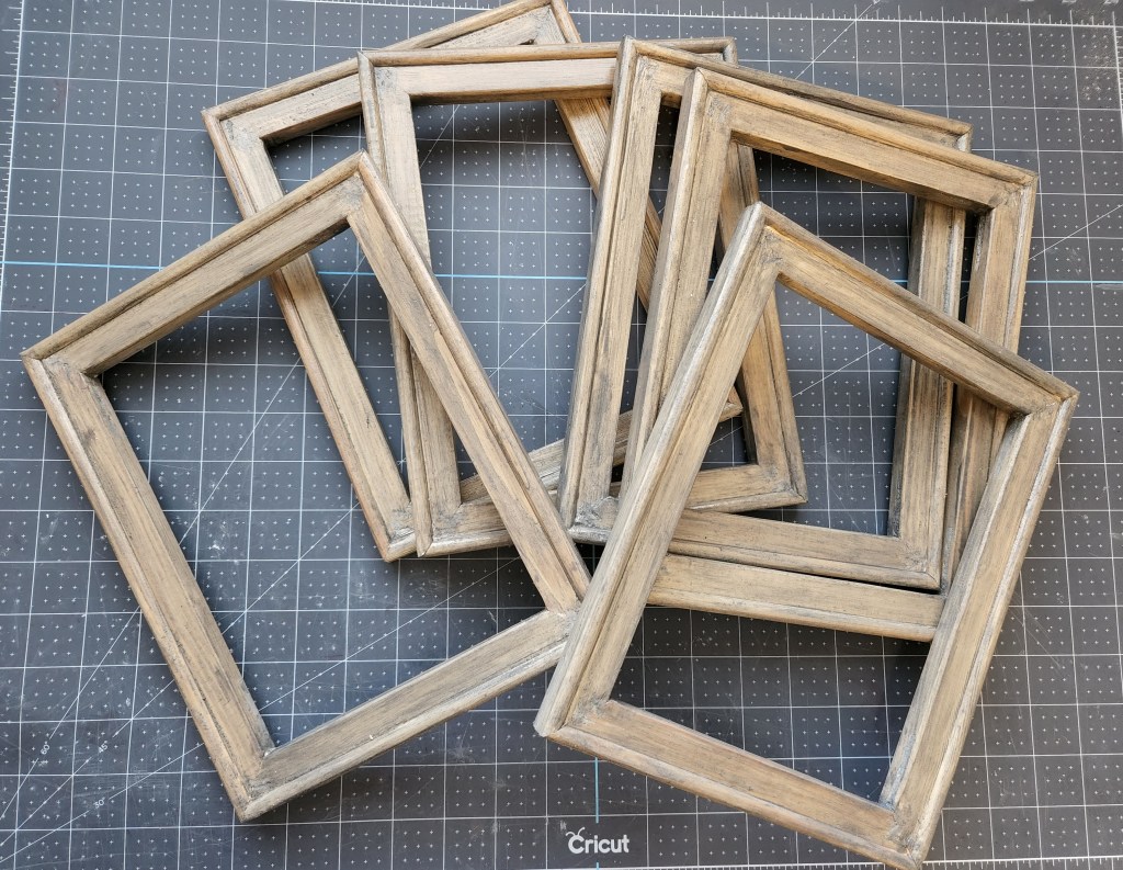 Six wood frames stained to use as the frame of the farmhouse flag. 