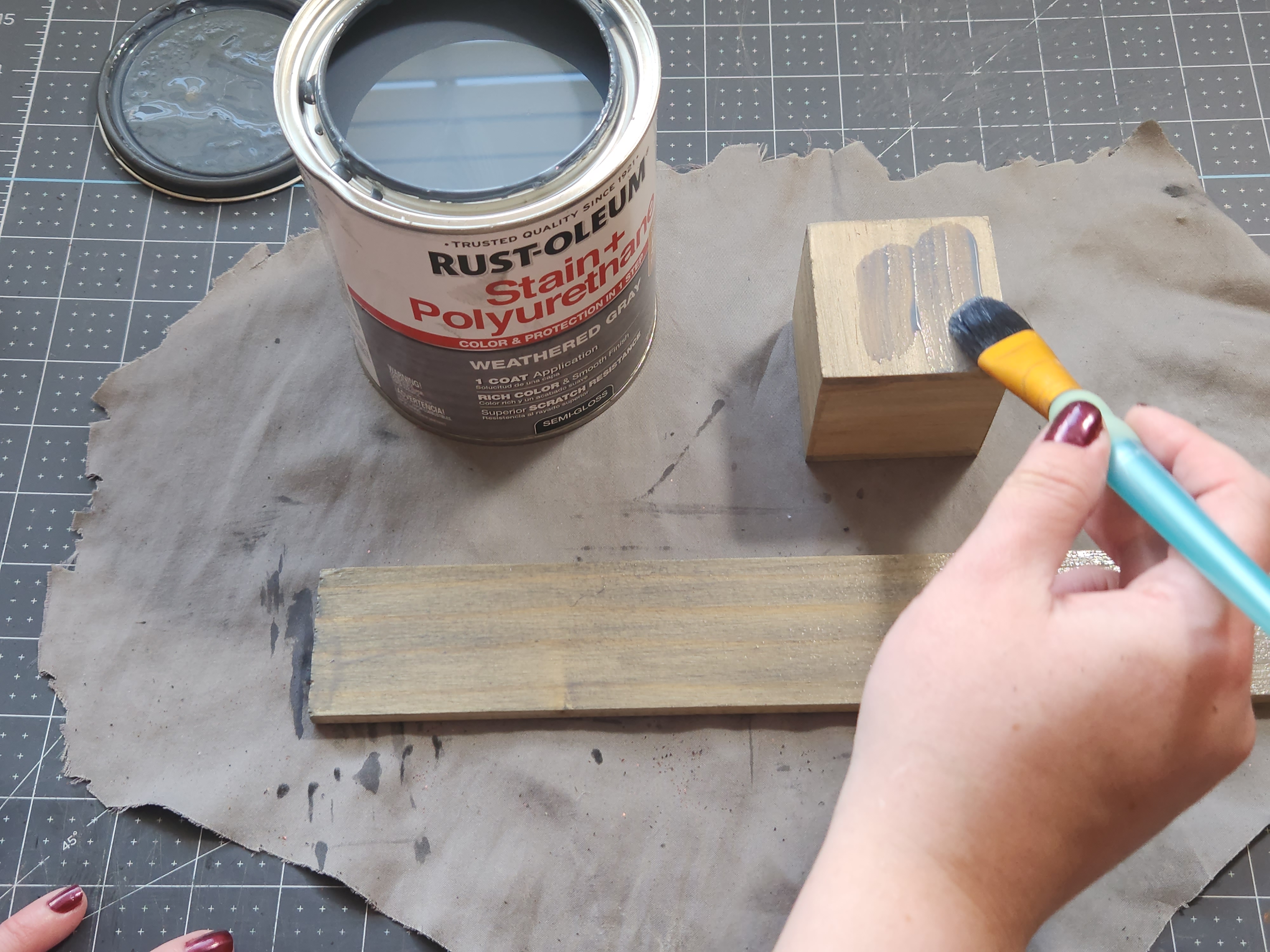 Staining a 2.5" wood block with weathered gray stain.