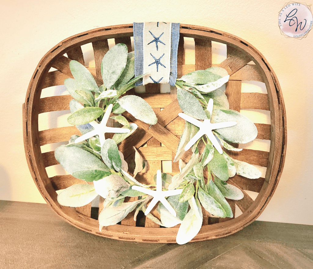 Finished lamb's ear starfish wreath attached to a tobacco basket.
